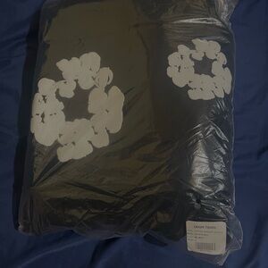 Denim Tears Black Hoodie with White Floral Design